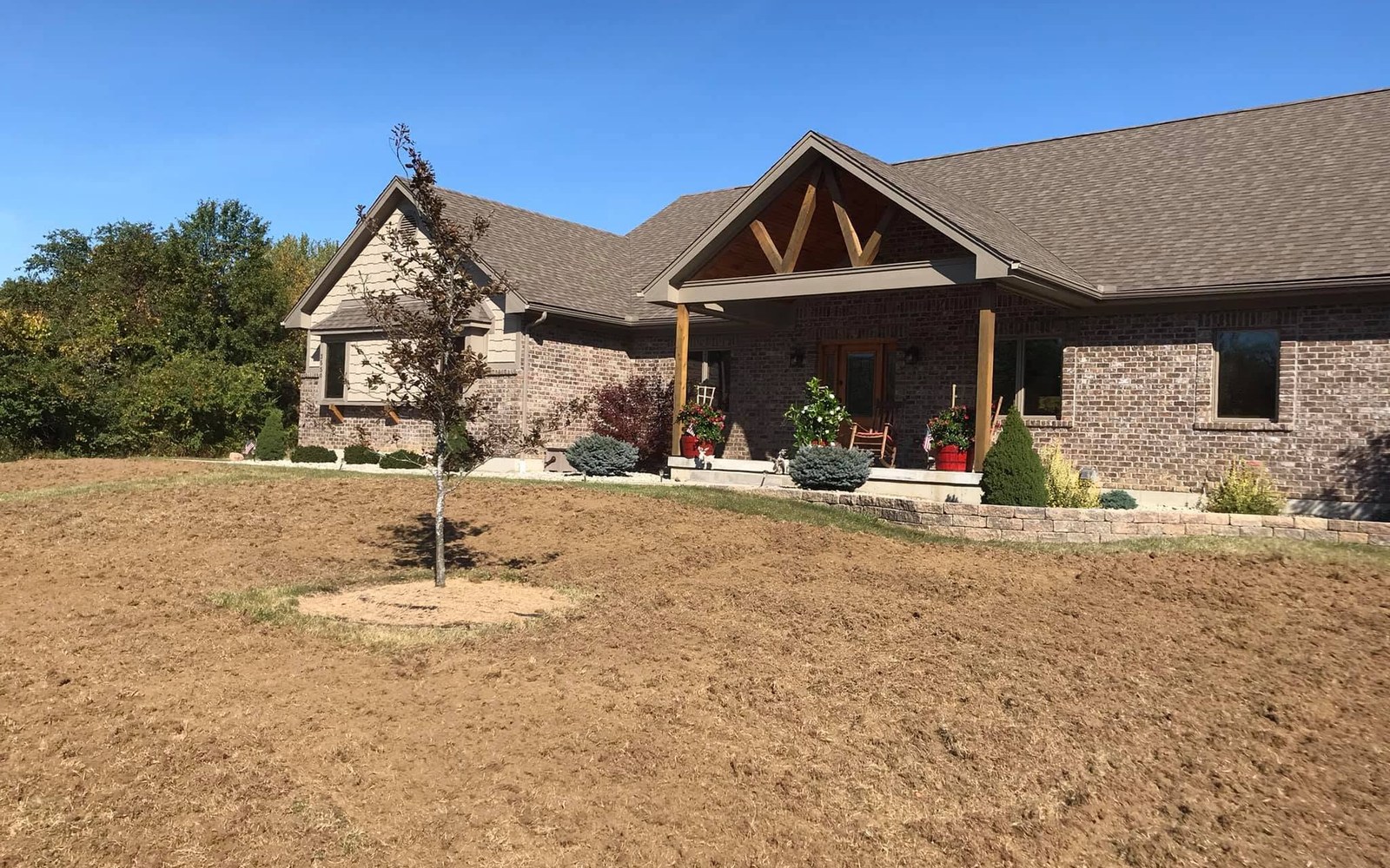 Brick home with its front property freshly graded